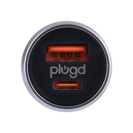 Round black USB car charger with 'plugd' branding on a white background
